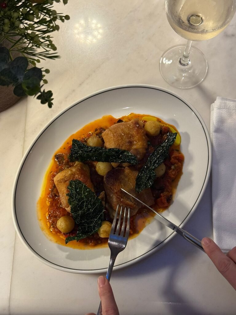 Crispy Chicken Thighs with Tomato and Pepper Sauce, Potato Pearls and Cavolo Nero
